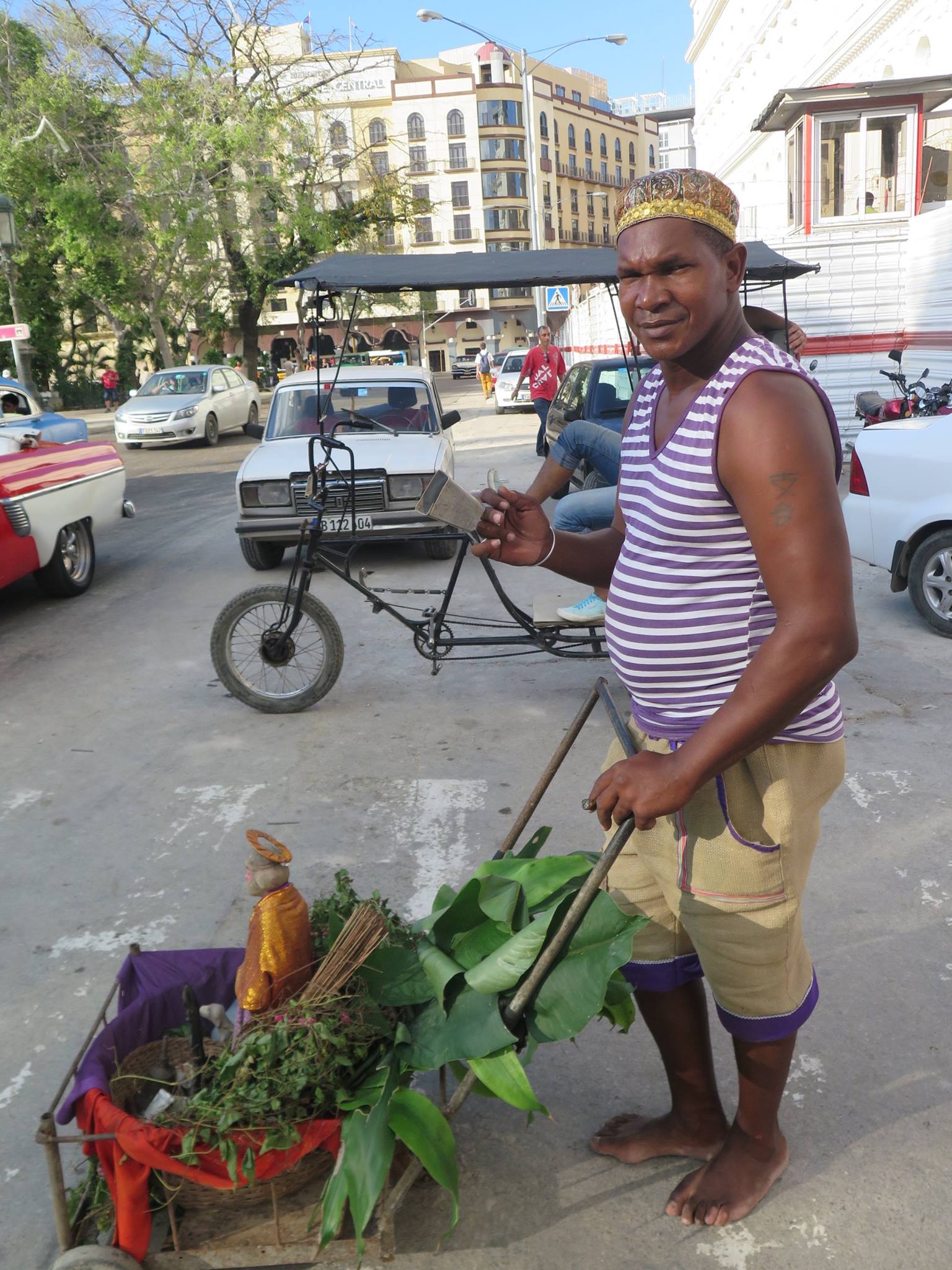 san lazaro, saint lazaro, celebration, worship, religion, santeria, catholicism, catholic, cuba, cuban, cuban streets, cuban celebration, streets of cuba, saint, patron saint of suffering, caribbean island, worshippers, food, vegetables, man, produce, 